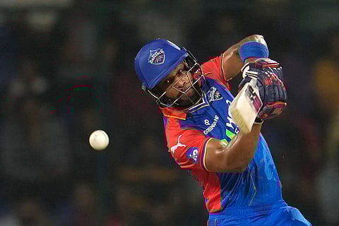 Shai Hope plays a shot